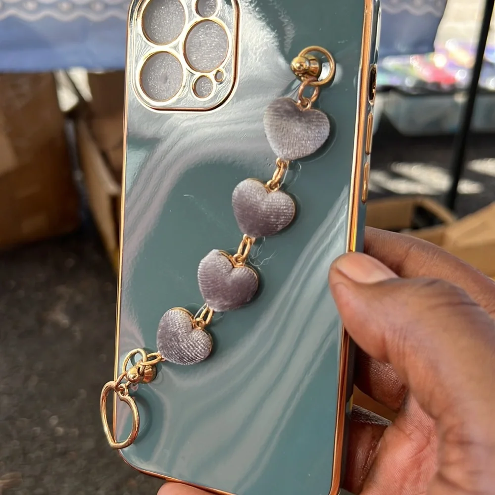 iPhone 12 Pro Max case with heart attachment